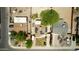 Overhead view of a house with solar panels and its surroundings in a residential neighborhood at 2542 W Missouri Ave, Phoenix, AZ 85017