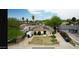 Charming single-Gathering home featuring a well-manicured lawn and solar panels at 2542 W Missouri Ave, Phoenix, AZ 85017