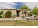 Charming single-story home featuring well-maintained landscaping and a quaint front porch area at 2542 W Missouri Ave, Phoenix, AZ 85017
