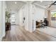 Inviting foyer with hardwood floors leads to a well-lit office space at 2885 N 164Th Dr, Goodyear, AZ 85395