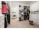 Large walk-in closet with custom shelving and ample storage space at 2885 N 164Th Dr, Goodyear, AZ 85395
