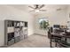 Bright office space with natural lighting, neutral color scheme and ceiling fan at 3215 W Phelps Rd, Phoenix, AZ 85053