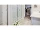 Shower with glass doors and access to a walk-in closet in the bathroom at 33974 N Beeblossom Trl, San Tan Valley, AZ 85144