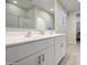 Bright bathroom with double sinks, modern fixtures, and ample counter space at 33974 N Beeblossom Trl, San Tan Valley, AZ 85144