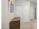 Cozy bedroom with gray walls, wood dresser, and closet with sliding doors at 33974 N Beeblossom Trl, San Tan Valley, AZ 85144