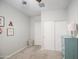 Bright and well-lit bedroom featuring neutral walls and carpet, and a closet with sliding doors at 33974 N Beeblossom Trl, San Tan Valley, AZ 85144