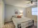 Bright bedroom with ceiling fan and minimalist decor for a calming atmosphere at 33974 N Beeblossom Trl, San Tan Valley, AZ 85144