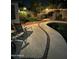 Backyard view with patio area, a pool, outdoor grill, seating, and desert landscaping at 462 S Marie Dr, Chandler, AZ 85225
