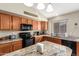 Well-equipped kitchen featuring granite countertops, modern appliances, and ample cabinet space at 462 S Marie Dr, Chandler, AZ 85225