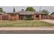 Lovely brick home featuring a lush green lawn and a tidy, inviting facade at 5605 N 19Th St, Phoenix, AZ 85016