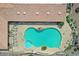 Large community pool with lounge chairs and a spa, surrounded by lush landscaping at 5830 E Mckellips Rd # 30, Mesa, AZ 85215