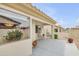 Covered patio offers an inviting space for outdoor seating in the serene backyard at 5830 E Mckellips Rd # 30, Mesa, AZ 85215