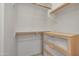 Walk-in closet with white shelving and dresser for storage at 5830 E Mckellips Rd # 30, Mesa, AZ 85215