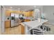 Modern kitchen with stainless appliances, ample cabinetry, and a breakfast bar at 5830 E Mckellips Rd # 30, Mesa, AZ 85215