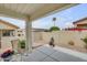 Covered patio offers a relaxing outdoor space with views of the landscaped backyard at 5830 E Mckellips Rd # 30, Mesa, AZ 85215