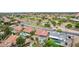 High angle view of the neighborhood with a single Gathering house featuring a refreshing pool, covered patio and lush trees at 6019 E Paradise Ln, Scottsdale, AZ 85254