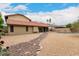 Spacious backyard with a pool, patio, and low-maintenance landscaping at 6019 E Paradise Ln, Scottsdale, AZ 85254