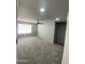 Cozy bedroom features plush gray carpeting, recessed lighting, and a ceiling fan at 6041 W Golden Ln, Glendale, AZ 85302