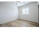 Bright bedroom with wood-look floors and large windows at 630 W Laredo St, Chandler, AZ 85225