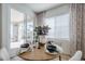 Dining area with glass doors to outside and an elegant table setting in a well-lit space at 630 W Laredo St, Chandler, AZ 85225