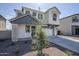 Charming two-story home featuring a two car garage, neutral color palette and low maintenance landscaping at 630 W Laredo St, Chandler, AZ 85225