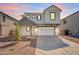 Charming two-story home featuring a two car garage, neutral color palette and low maintenance landscaping at 630 W Laredo St, Chandler, AZ 85225