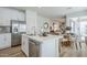 Kitchen with island, seating, stainless steel appliances, and an open layout at 630 W Laredo St, Chandler, AZ 85225