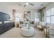 Bright living room featuring neutral decor, stylish furniture, and plenty of natural light from large windows at 630 W Laredo St, Chandler, AZ 85225