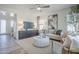 Comfortable living room featuring a sleek entertainment unit, stylish seating, and bright, airy atmosphere at 630 W Laredo St, Chandler, AZ 85225