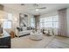 Bright, modern living room featuring neutral decor, plush seating, and ample natural light at 630 W Laredo St, Chandler, AZ 85225
