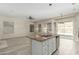 Gourmet kitchen with an island, stainless steel appliances, and ample cabinet space at 6528 W Via Montoya Dr, Glendale, AZ 85310