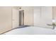 Bright bedroom features a queen bed, closet, and a view of the room at 7229 S Butte Ave, Tempe, AZ 85283