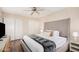 Comfortable primary bedroom featuring a ceiling fan, closet space, and a neutral color palette at 7229 S Butte Ave, Tempe, AZ 85283