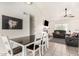 Open-concept dining area seamlessly connects to the living space and kitchen, perfect for entertaining at 7229 S Butte Ave, Tempe, AZ 85283