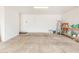 Spacious garage with ample storage and a work area at 7229 S Butte Ave, Tempe, AZ 85283