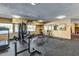 Community gym featuring modern exercise equipment, weights, mirrors, and natural lighting from the windows at 7625 E Camelback Rd # B124, Scottsdale, AZ 85251