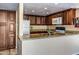 Well-equipped kitchen featuring granite countertops, stainless steel appliances, and ample cabinet space at 7625 E Camelback Rd # B124, Scottsdale, AZ 85251