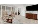 Bright living room with tile floors and modern furniture at 7625 E Camelback Rd # B124, Scottsdale, AZ 85251