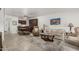 Open-concept living room with dining area and tile flooring at 7625 E Camelback Rd # B124, Scottsdale, AZ 85251