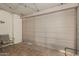 The covered patio includes tiled floors and a metal roll-up door, offering versatile space at 7625 E Camelback Rd # B124, Scottsdale, AZ 85251