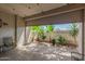 Covered patio with roll-up door provides natural light and an easy transition to the yard at 7625 E Camelback Rd # B124, Scottsdale, AZ 85251