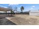Backyard features covered patio and ample space for gardening at 7720 W Indianola Ave, Phoenix, AZ 85033