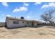 Exterior backyard featuring a home with an expansive, partially covered area at 7720 W Indianola Ave, Phoenix, AZ 85033