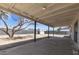 Covered patio overlooking a spacious backyard with block fence at 7720 W Indianola Ave, Phoenix, AZ 85033