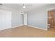 Spacious bedroom featuring tile floors, closet, and neutral paint for a bright feel at 7720 W Indianola Ave, Phoenix, AZ 85033