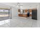 Open-concept kitchen featuring modern appliances and stylish finishes at 7720 W Indianola Ave, Phoenix, AZ 85033