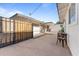 A gated backyard with a mix of concrete and gravel, offering space for outdoor activities at 8044 N 10Th Pl, Phoenix, AZ 85020