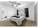 Bedroom featuring carpet, natural light, and a view into the bathroom area at 8044 N 10Th Pl, Phoenix, AZ 85020