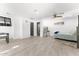 A large bedroom with an ensuite bathroom with ceiling fan, and recessed lights at 8044 N 10Th Pl, Phoenix, AZ 85020