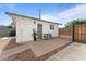 A guesthouse with a paved patio area that includes outdoor seating at 8044 N 10Th Pl, Phoenix, AZ 85020